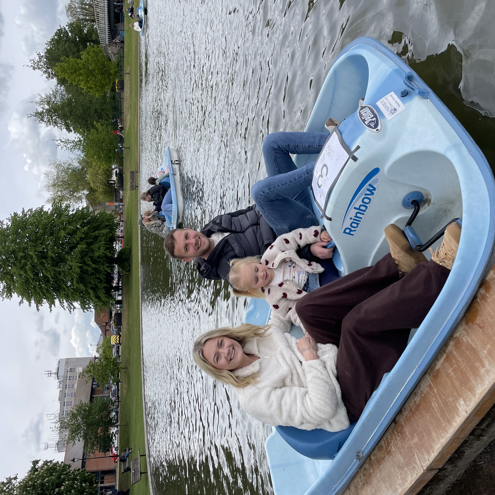 Family Enjoying The Pedalos